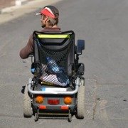 disabled man in an electric wheelchair