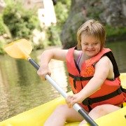 Girl with Downs Syndrome canoeing